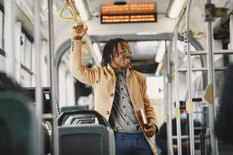African,American,Man,Riding,In,The,City,Bus